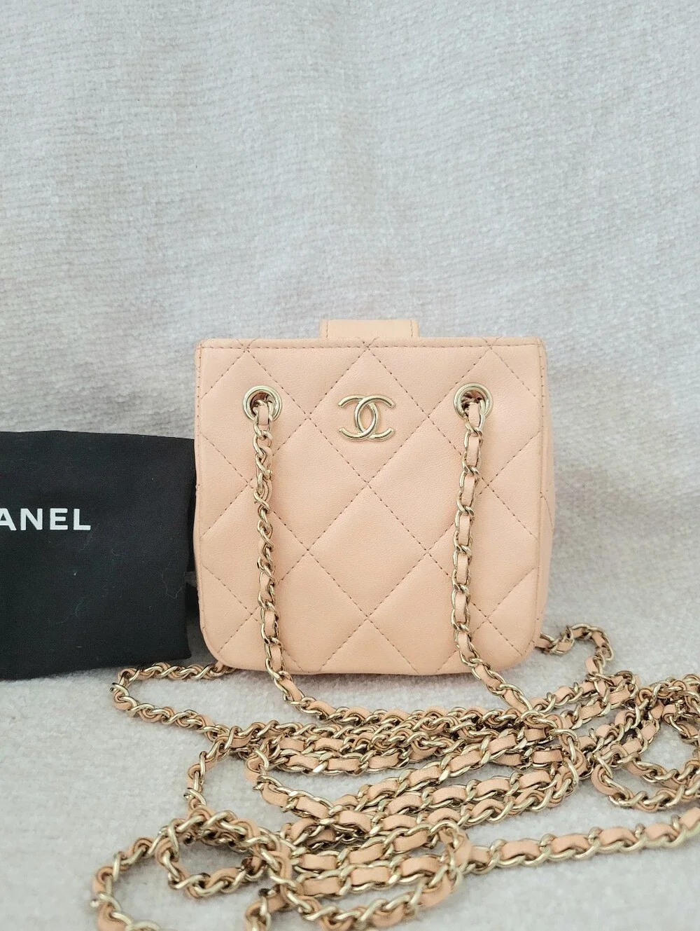 CHANEL Quilted Mini Pochette Crossbody in Light Blush with Gold Hardware